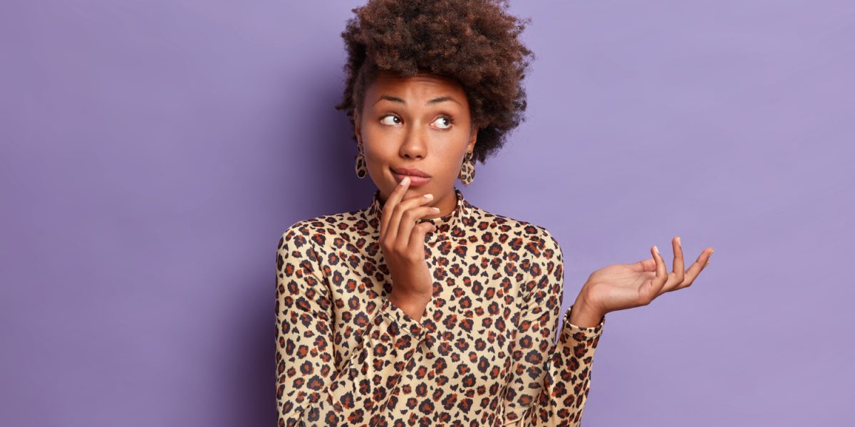 Portrait Confused Dark Skinned Female Model Dressed Leopard Clothing Cannot